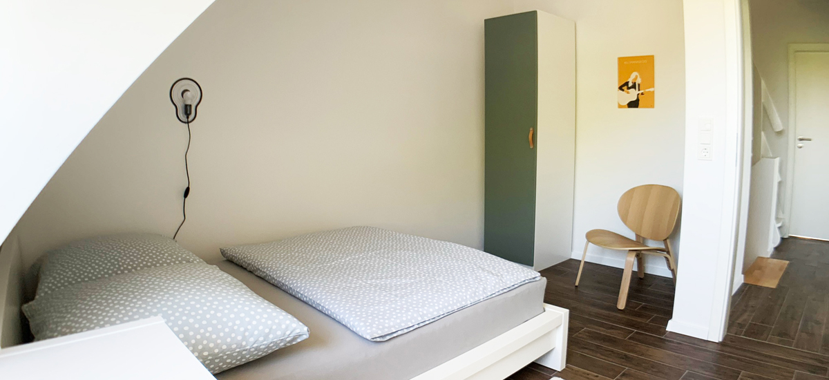 Schlafzimmer Ferienhaus Endje van de Welt Ditzum