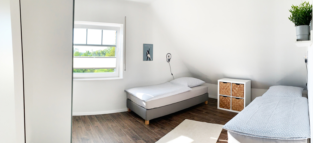 Schlafzimmer Ferienhaus Endje van de Welt Ditzum