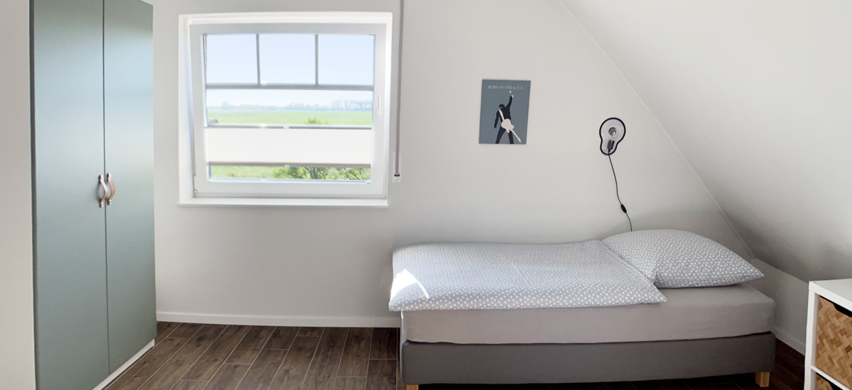 Schlafzimmer Ferienhaus Endje van de Welt Ditzum